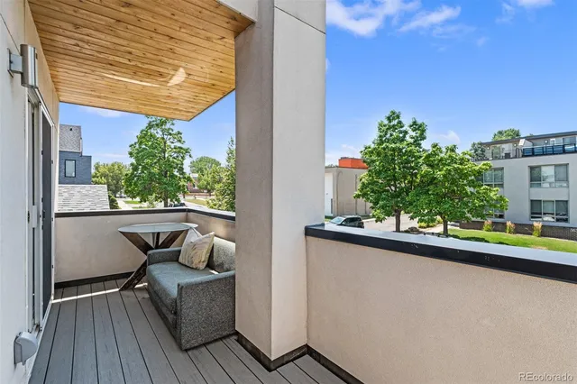 a outdoor space with patio the couches and a umbrella