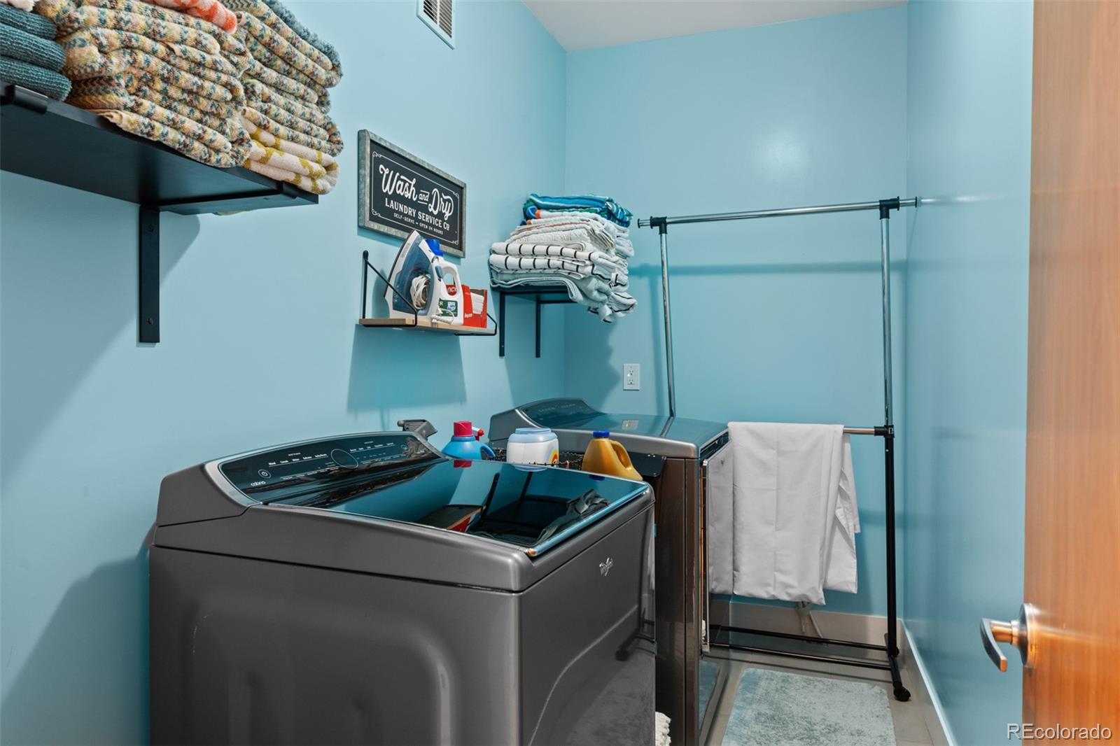 3632 North Pecos Street Denver, CO 80211 - Photo 33 of 47 a utility room with dryer and washer