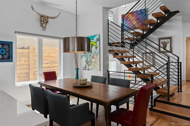 a view of a living room and dining room