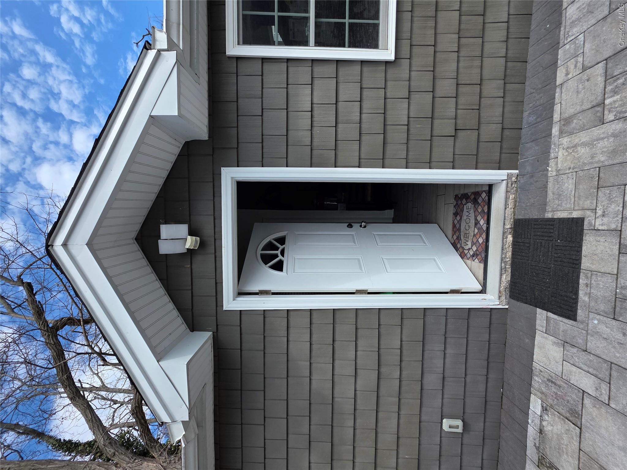 15 Ivy Road Mastic Beach, NY 11951 - Photo 15 of 24 a view of a door of the house