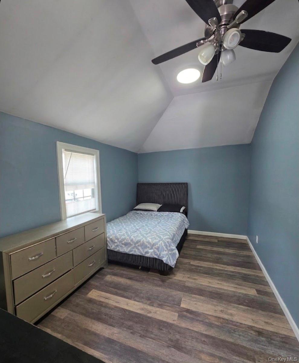 15 Ivy Road Mastic Beach, NY 11951 - Photo 18 of 24 a bedroom with a bed and a window
