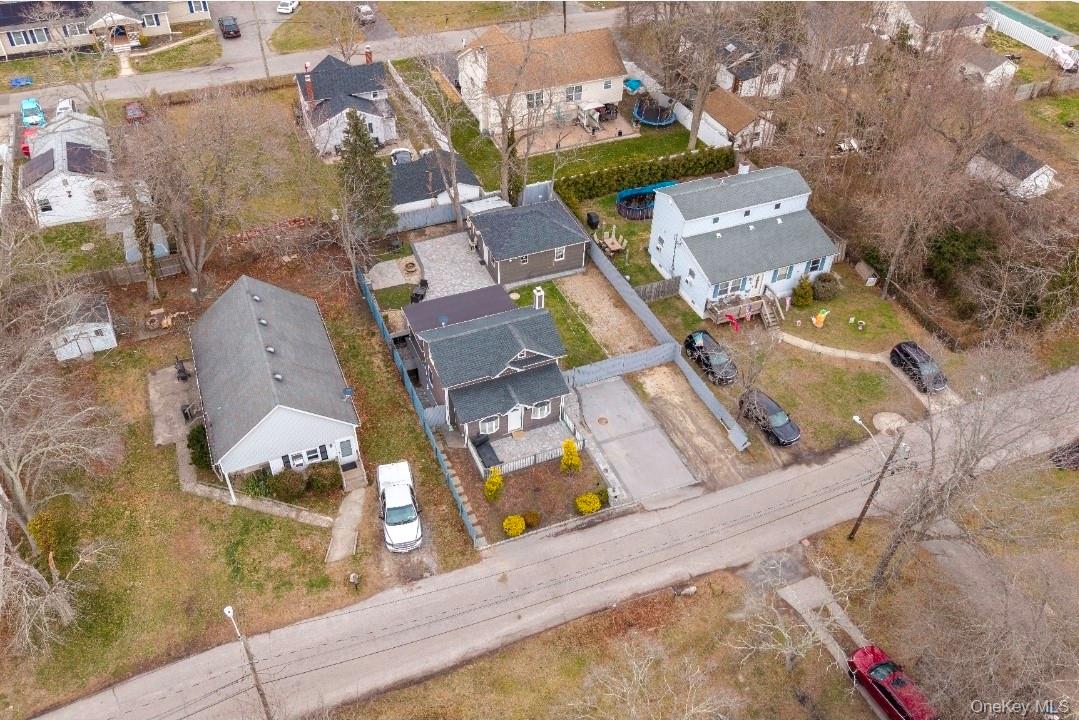 15 Ivy Road Mastic Beach, NY 11951 - Photo 21 of 24 an aerial view of residential houses with outdoor space