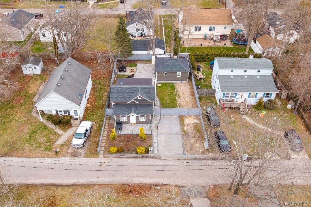 15 Ivy Road Mastic Beach, NY 11951 - Photo 24 of 24 an aerial view of residential houses with outdoor space