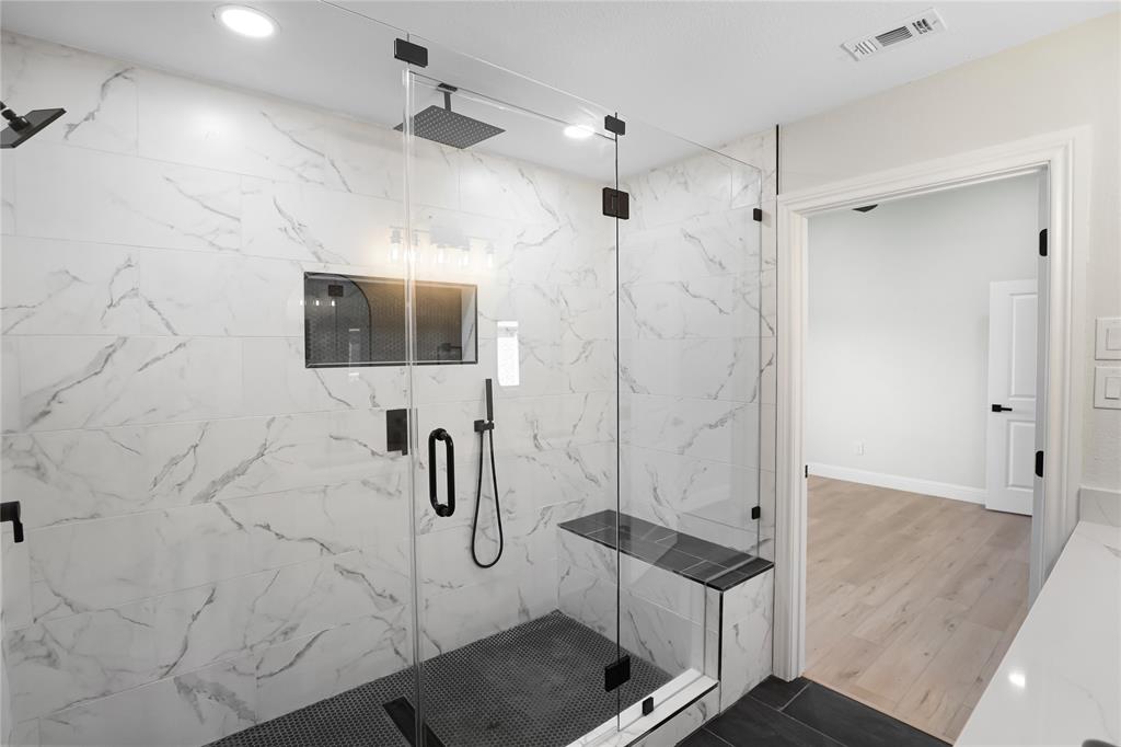 115 Santa Fe Trail Justin, TX 76247 - Photo 1 of 1 a bathroom with a shower and mirror