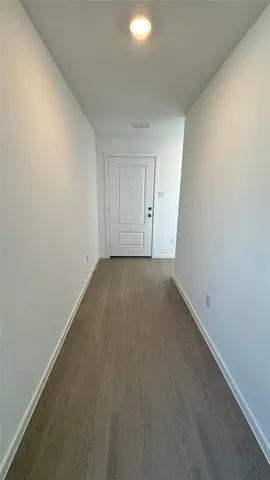 a kitchen with a sink a stove and cabinets