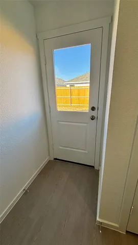a utility room with cabinets