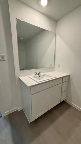 a view of an empty room and a window