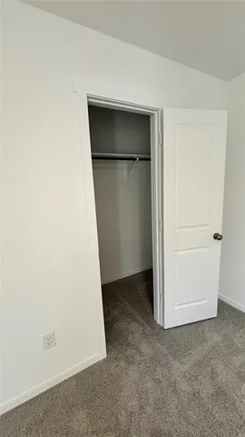 a view of a backyard of the house