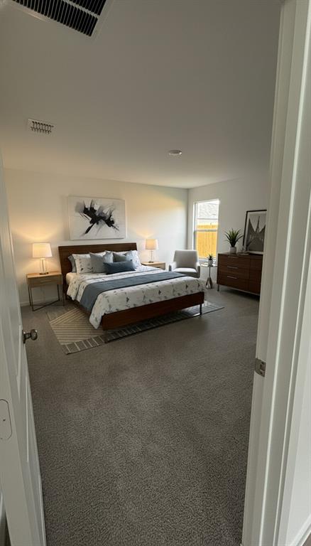 406 Bower Drive Princeton, TX 75407 - Photo 4 of 9 a bedroom with bed and window