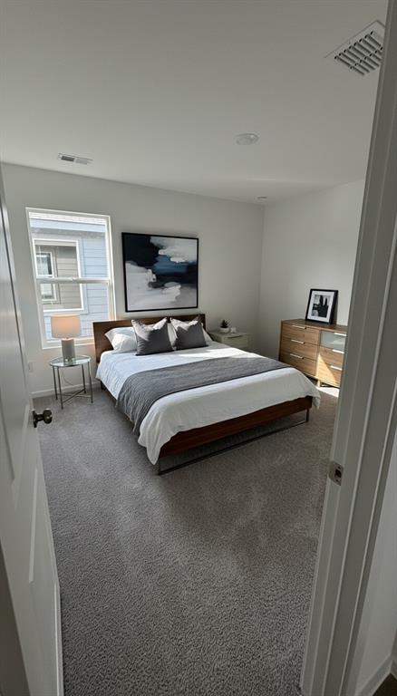 406 Bower Drive Princeton, TX 75407 - Photo 8 of 9 a bedroom with bed and window