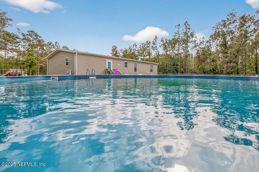 10545 Baylor Avenue Hastings, FL 32145 - Photo 13 of 17 a view of a small garden