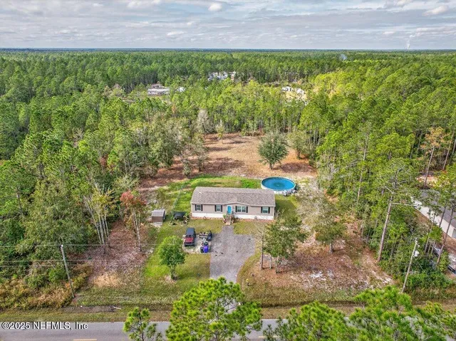 a view of a yard with outdoor space