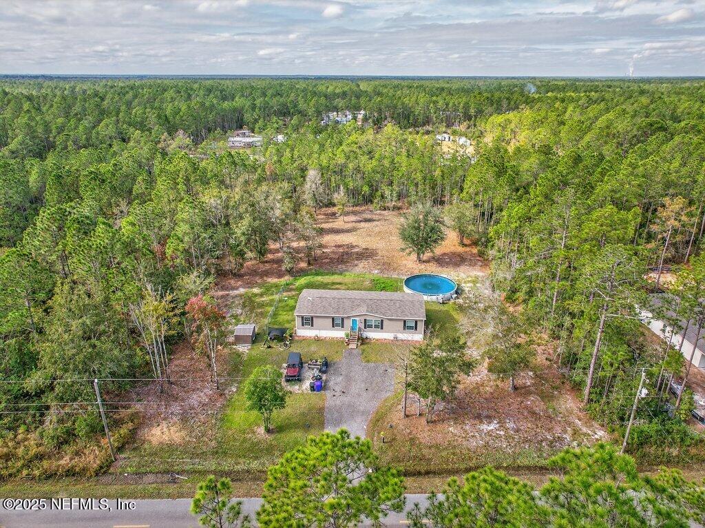 10545 Baylor Avenue Hastings, FL 32145 - Photo 3 of 17 a view of a yard with outdoor space