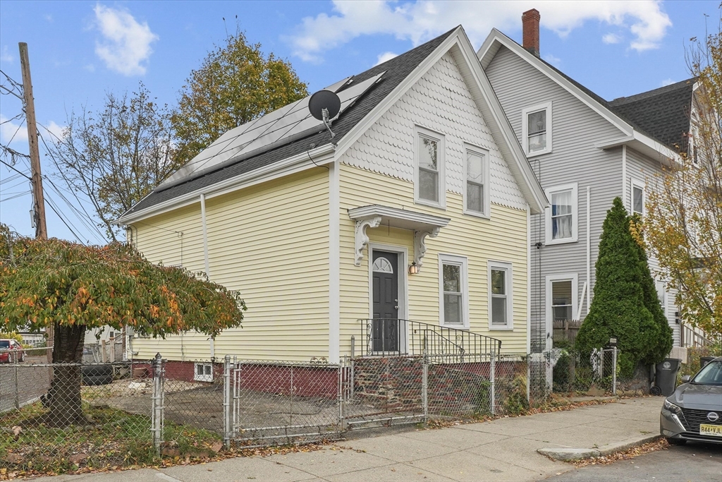 134 High Street Haverhill, MA 01832 - Photo 2 of 31 a view of a white house with large windows