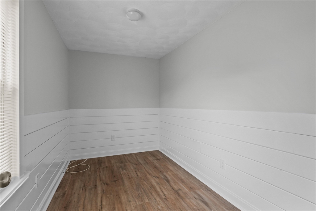 134 High Street Haverhill, MA 01832 - Photo 23 of 31 a view of a small space with empty racks