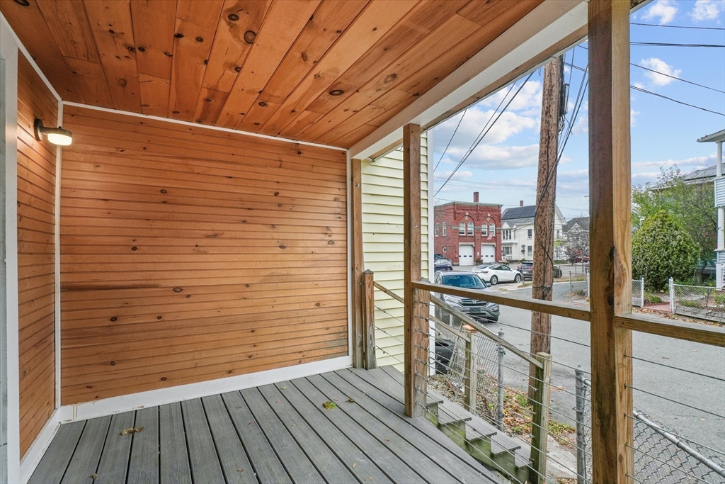 134 High Street Haverhill, MA 01832 - Photo 26 of 31 a view of a balcony with wooden floor