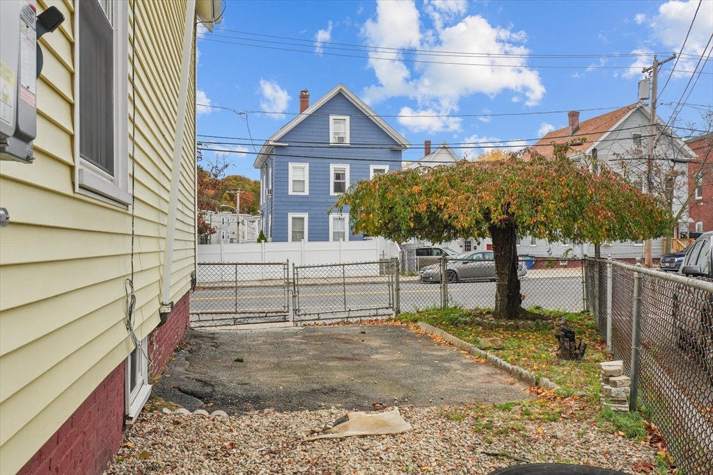134 High Street Haverhill, MA 01832 - Photo 29 of 31 a view of a house with a yard