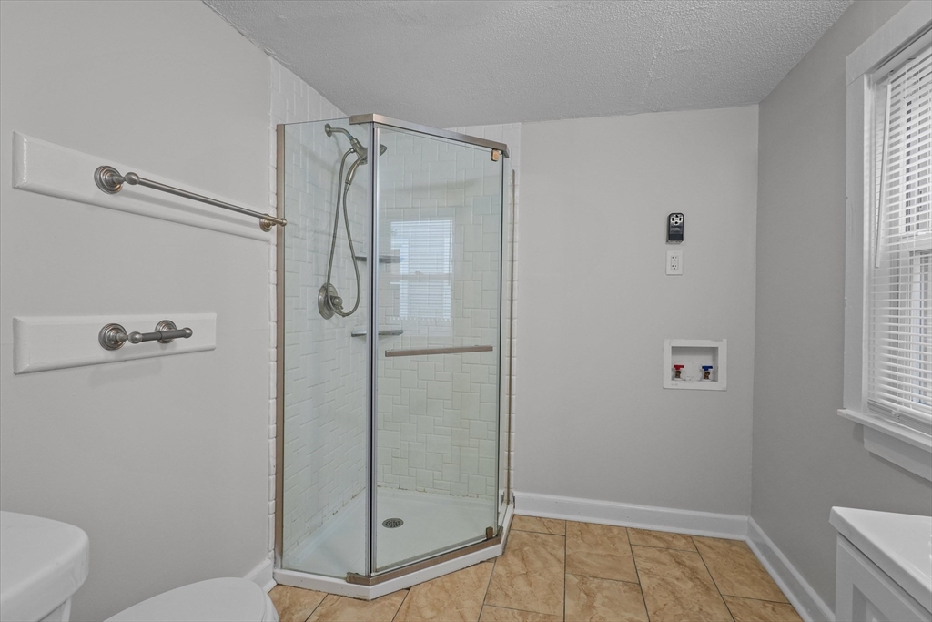 134 High Street Haverhill, MA 01832 - Photo 8 of 31 a bathroom with a shower