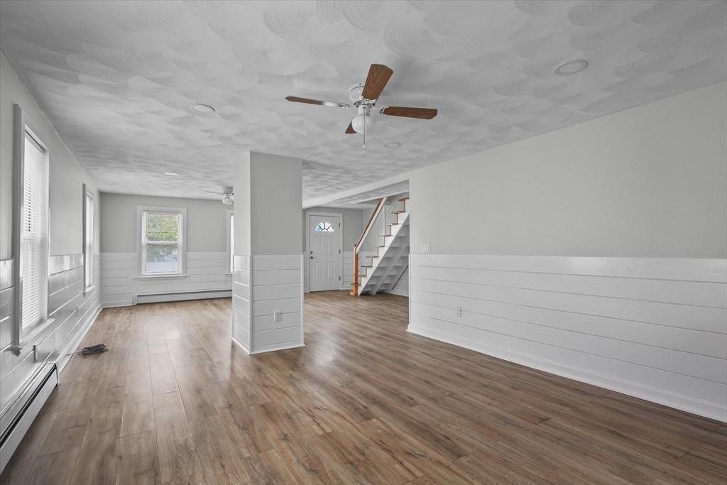 134 High Street Haverhill, MA 01832 - Photo 10 of 31 wooden floor in an empty room with a window