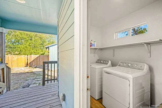 a utility room with dryer and washer