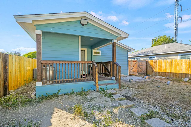 a backyard of a house with garden