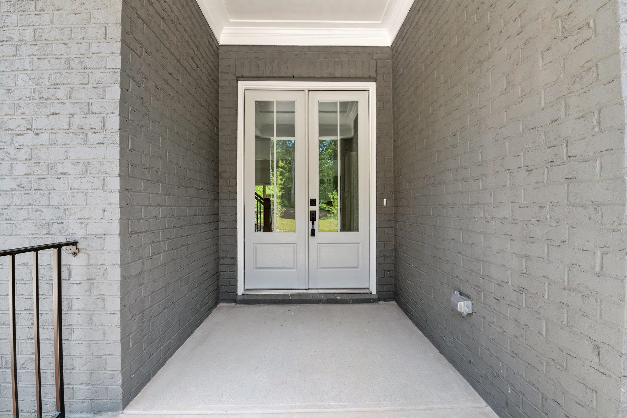 9312 Field Maple Court Raleigh, NC 27613 - Photo 2 of 49 Covered front porch with double doors