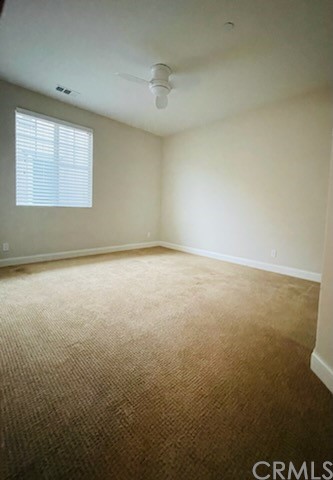 56 Shadowbrook Irvine, CA 92604 - Photo 15 of 20 an empty room with a empty space and windows