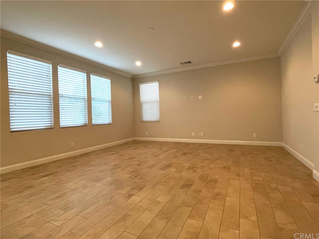 56 Shadowbrook Irvine, CA 92604 - Photo 7 of 20 a view of an empty room with a window