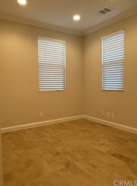 56 Shadowbrook Irvine, CA 92604 - Photo 8 of 20 a view of an empty room with a window