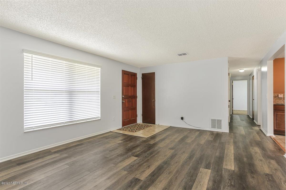 8236 Justin Road South Jacksonville, FL 32210 - Photo 2 of 11 02-Living Room