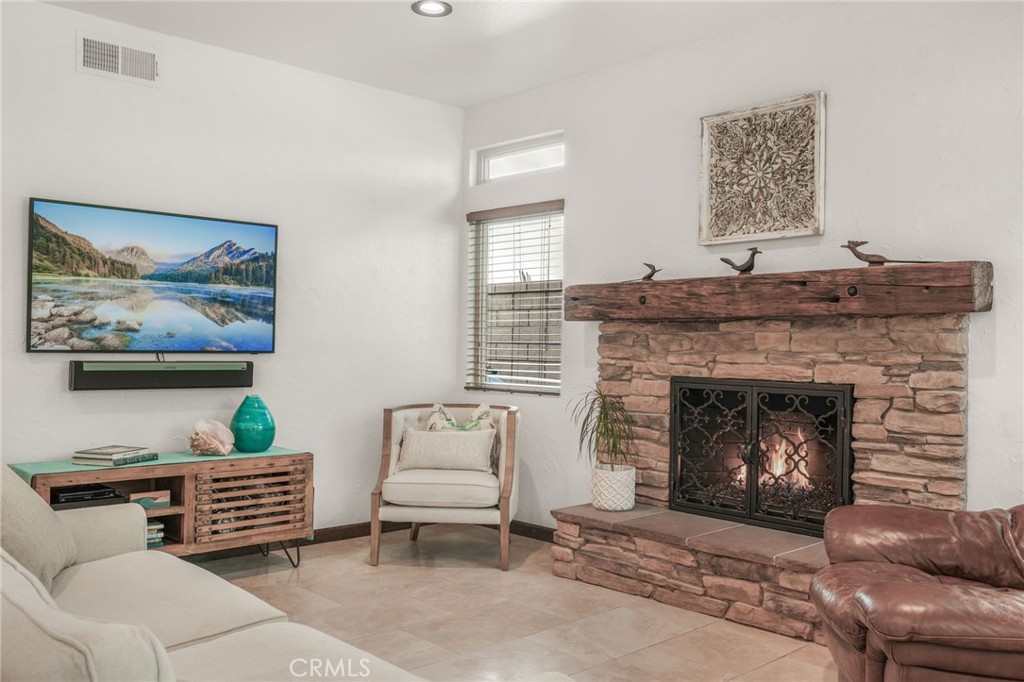 19066 Willow Brook Lane Lake Forest, CA 92679 - Photo 16 of 41 a living room with furniture and a fireplace