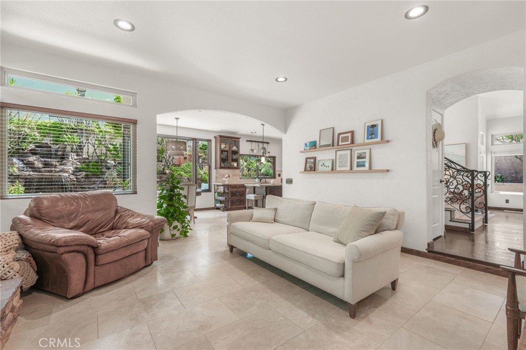 19066 Willow Brook Lane Lake Forest, CA 92679 - Photo 19 of 41 a living room with furniture and a large window