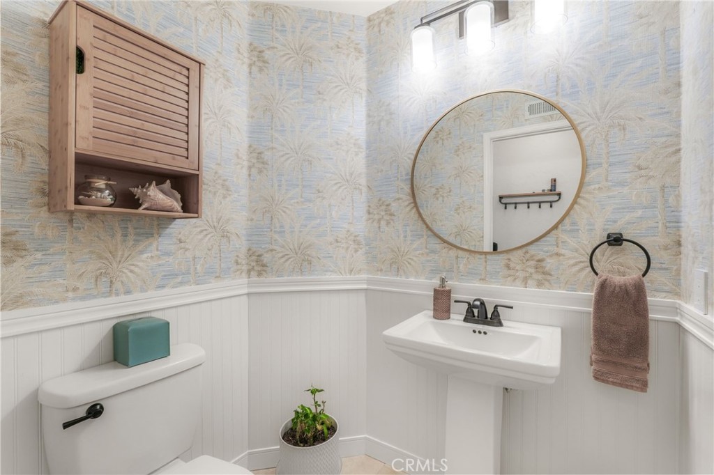 19066 Willow Brook Lane Lake Forest, CA 92679 - Photo 20 of 41 a bathroom with a sink and a mirror