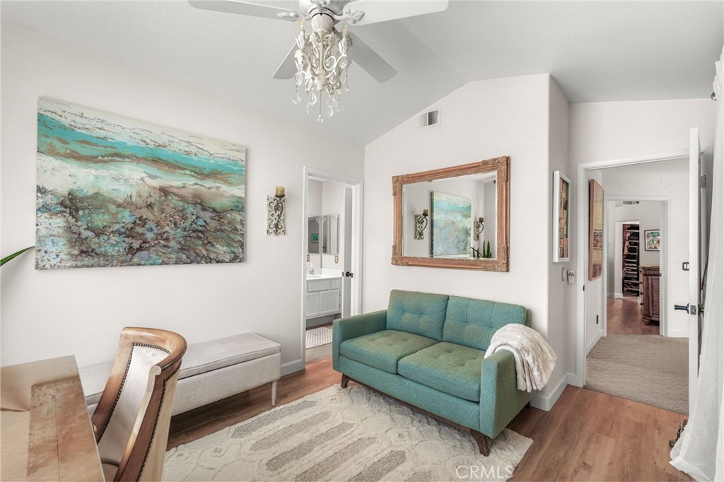 19066 Willow Brook Lane Lake Forest, CA 92679 - Photo 24 of 41 a living room with furniture and a chandelier