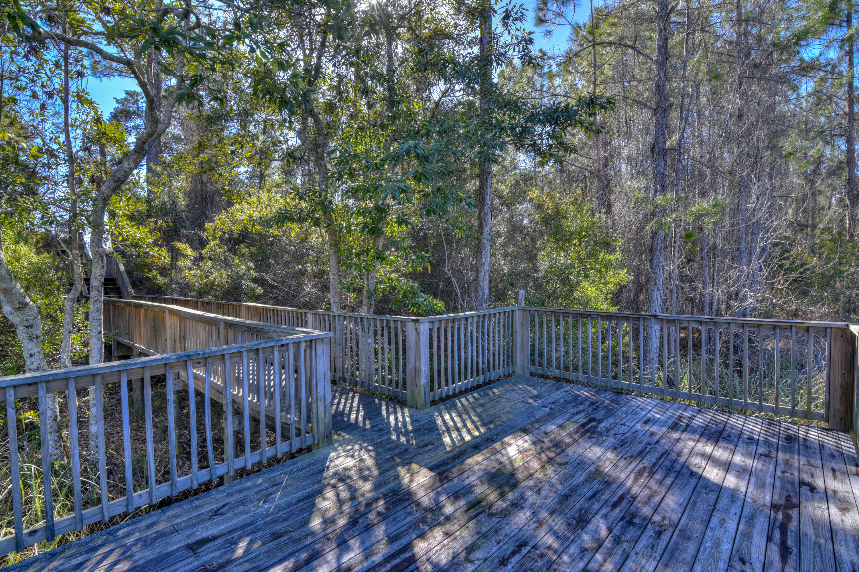 32 West Willow Mist Rd Inlet Beach Inlet Beach, FL 32461 - Photo 23 of 55 a view of deck with wooden fence and trees