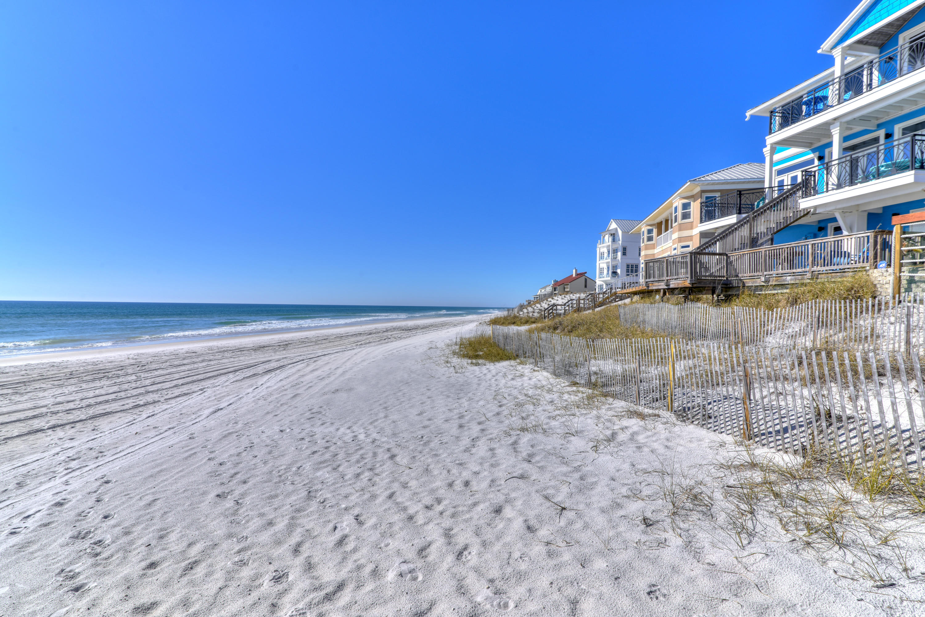 32 West Willow Mist Rd Inlet Beach Inlet Beach, FL 32461 - Photo 34 of 55 a view of an ocean with a building in the background