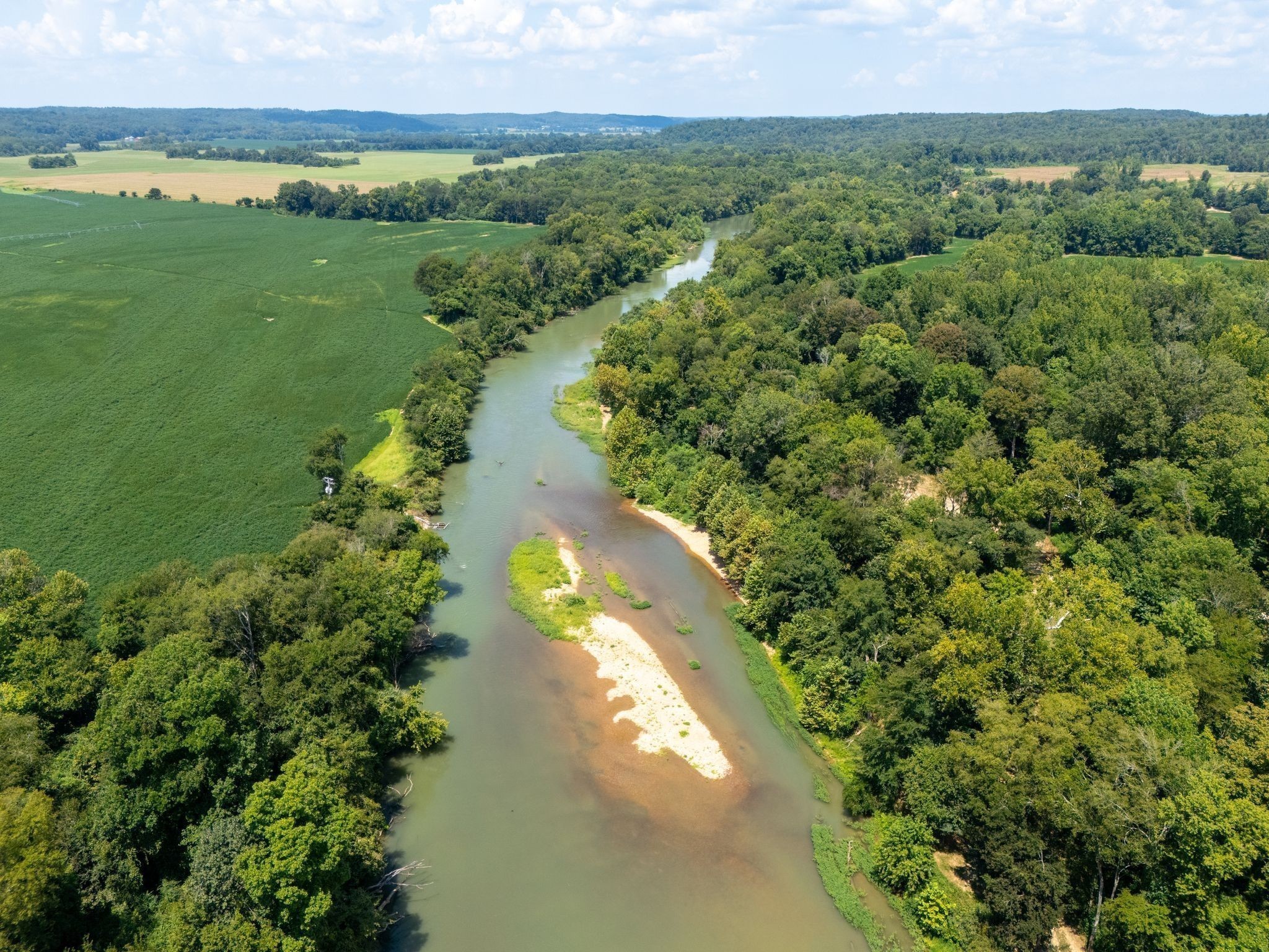 885 Dyer Road Hurricane Mills, TN 37078 - Photo 16 of 36 a view of a lake with a yard