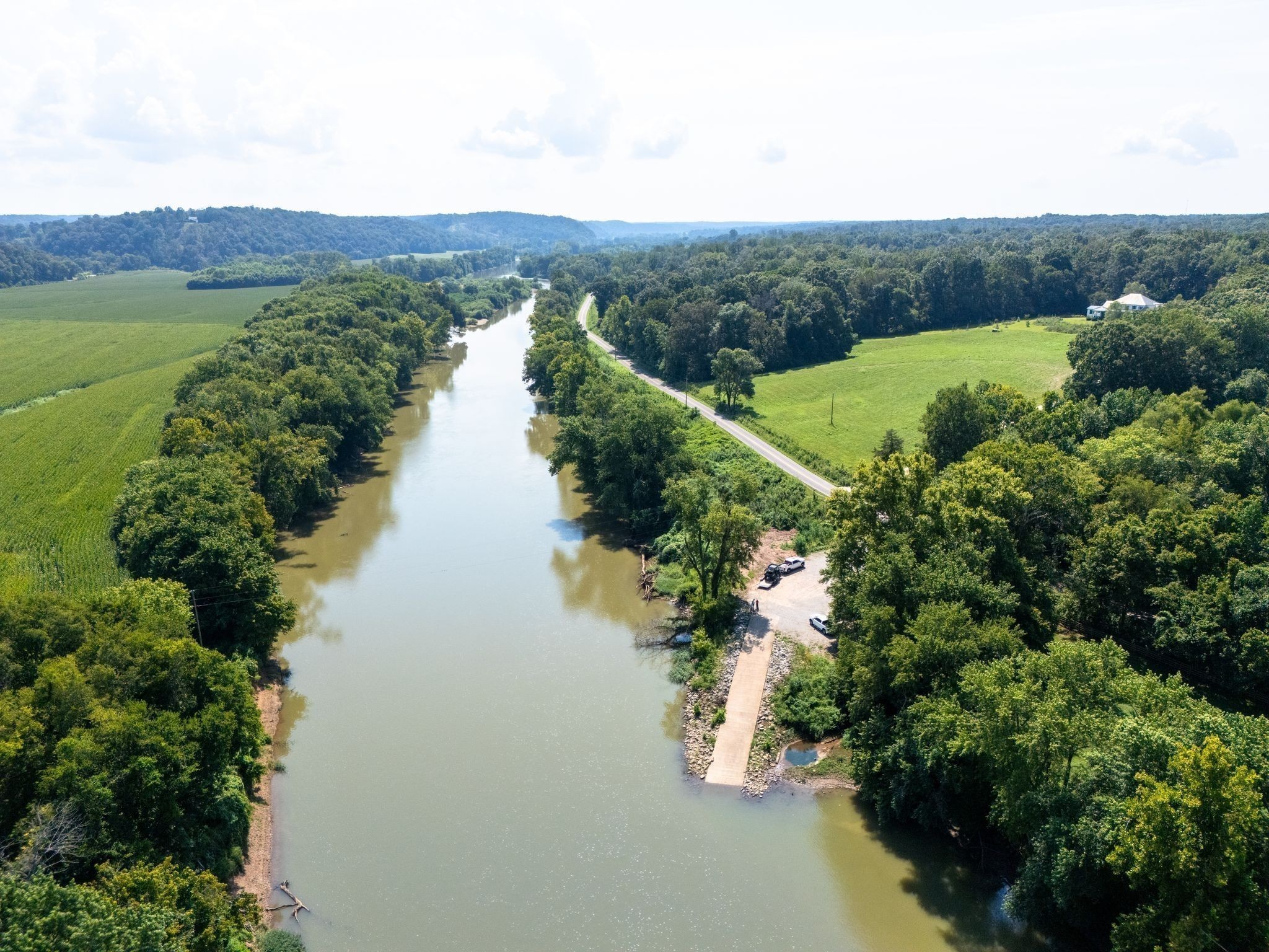 885 Dyer Road Hurricane Mills, TN 37078 - Photo 18 of 36 a view of a lake with mountain