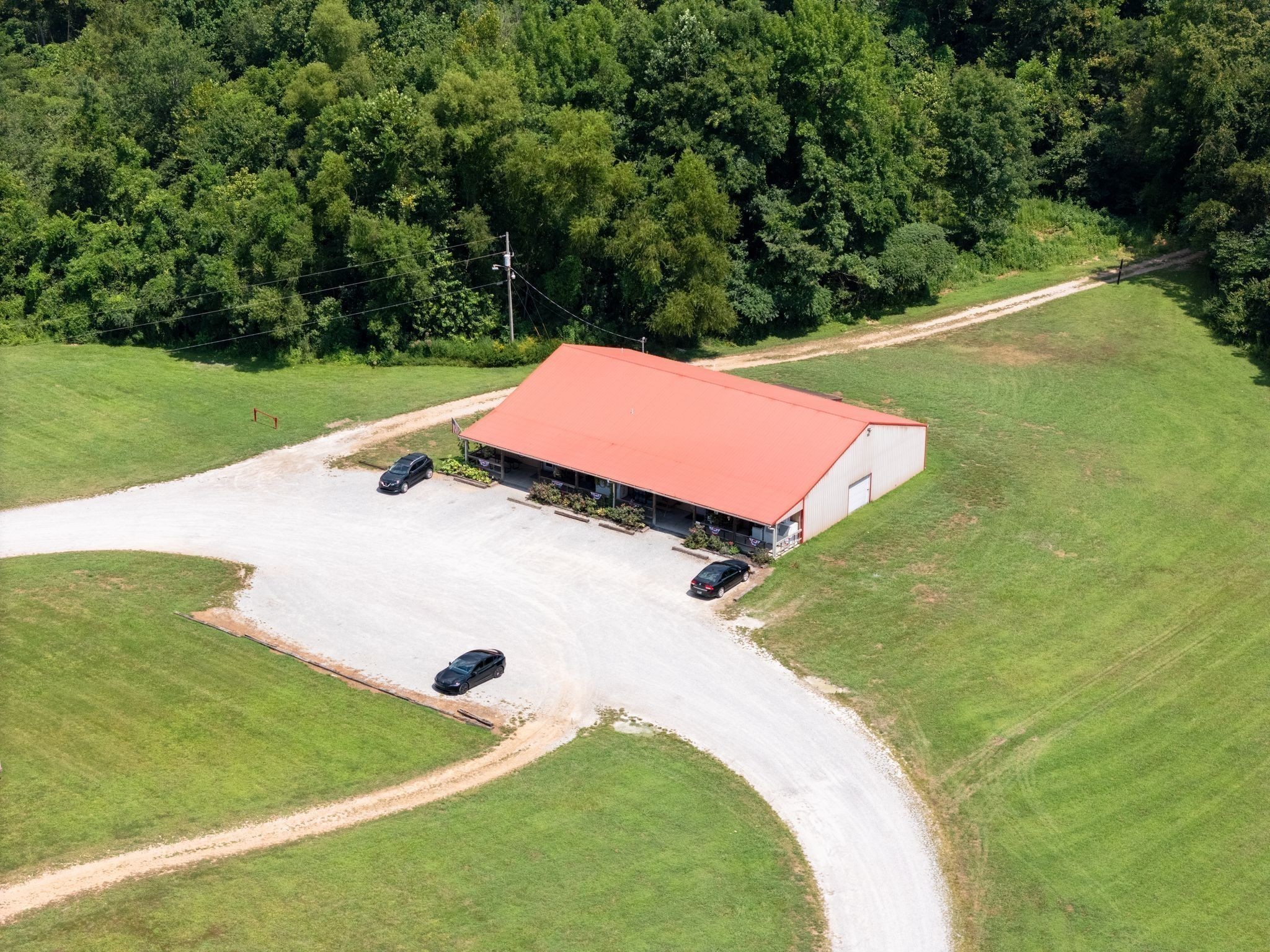 885 Dyer Road Hurricane Mills, TN 37078 - Photo 29 of 36 a view of a tennis ground with large trees