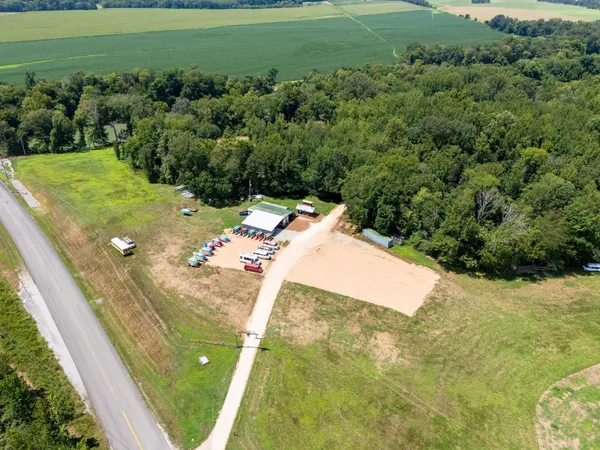 a view of a back yard of a house