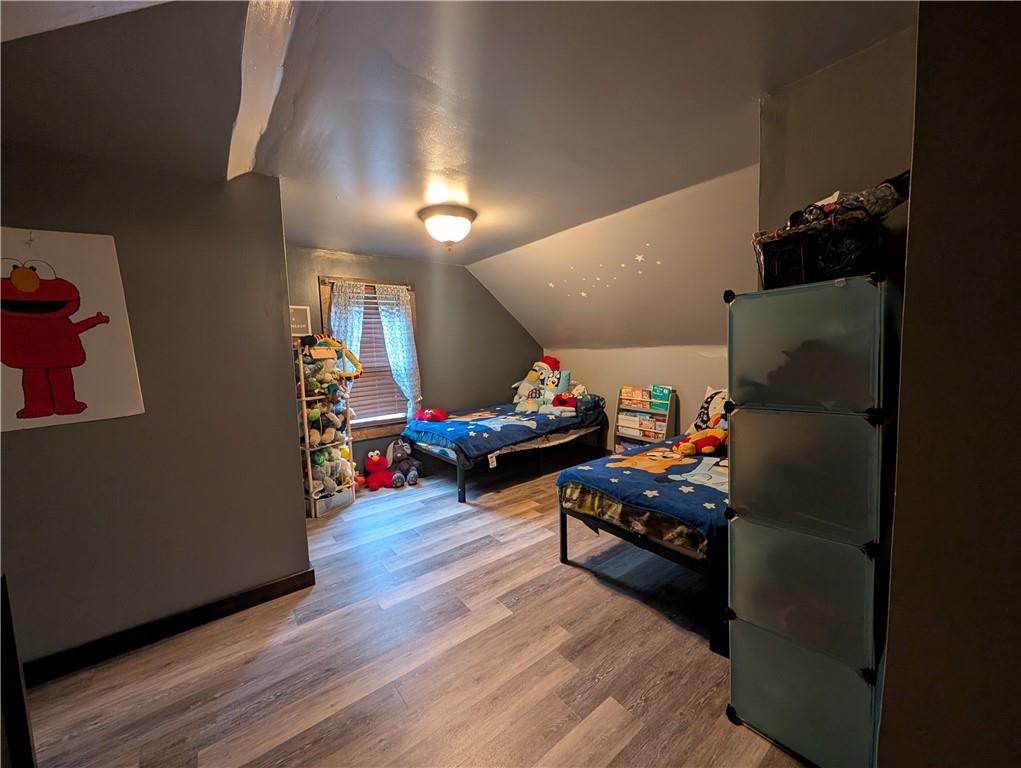 205 Woods Road Ligonier, PA 15658 - Photo 15 of 32 a children room with toys and wooden floor