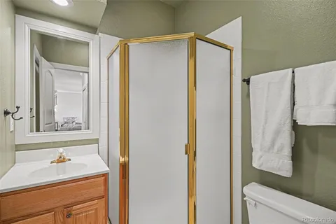 a bedroom with a large bed and a large window