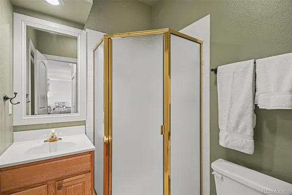 a bedroom with a large bed and a large window