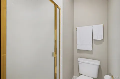 a view of a room with wooden roof