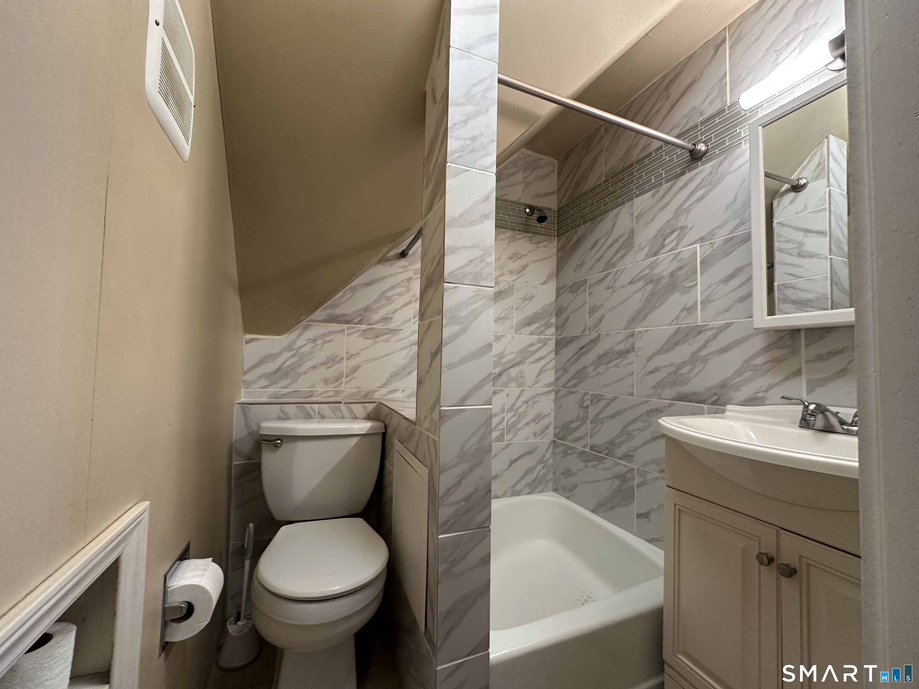 11 West Street New London, CT 06320 - Photo 20 of 24 a bathroom with a sink toilet and shower