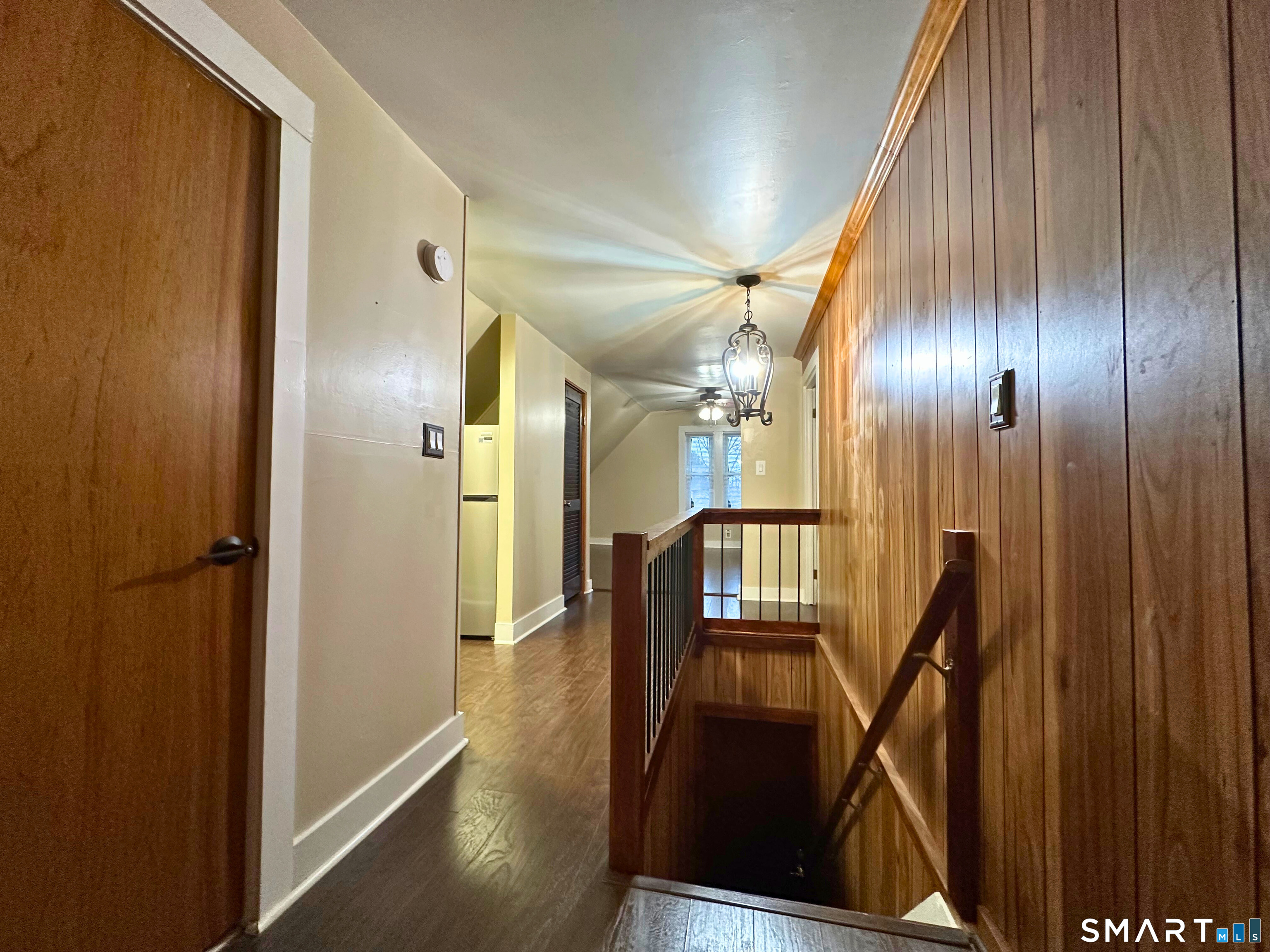 11 West Street New London, CT 06320 - Photo 6 of 24 a view of a hallway with wooden floor
