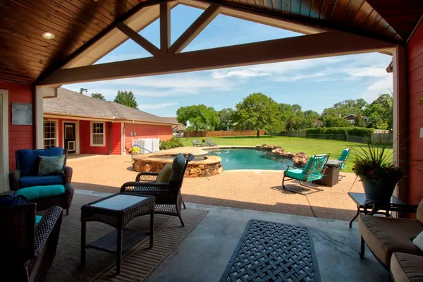 a patio view with a garden