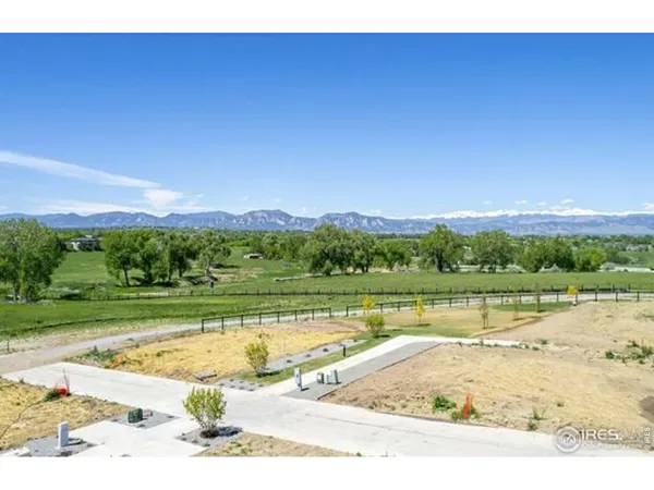 a view of lake with green space