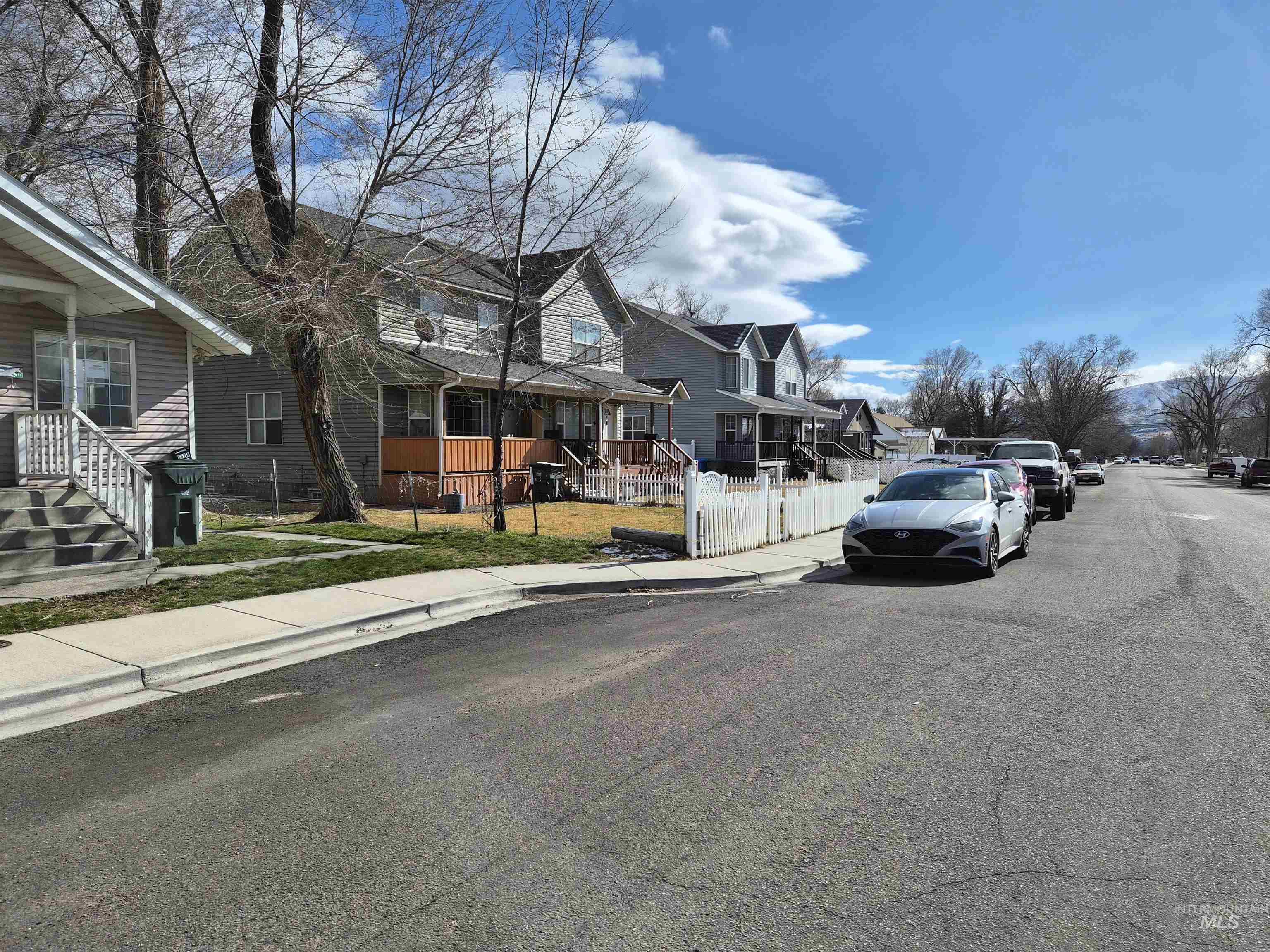 682 Randolph Avenue Pocatello, ID 83201 - Photo 25 of 29 View of asphalt road with sidewalks, a residential view, and curbs