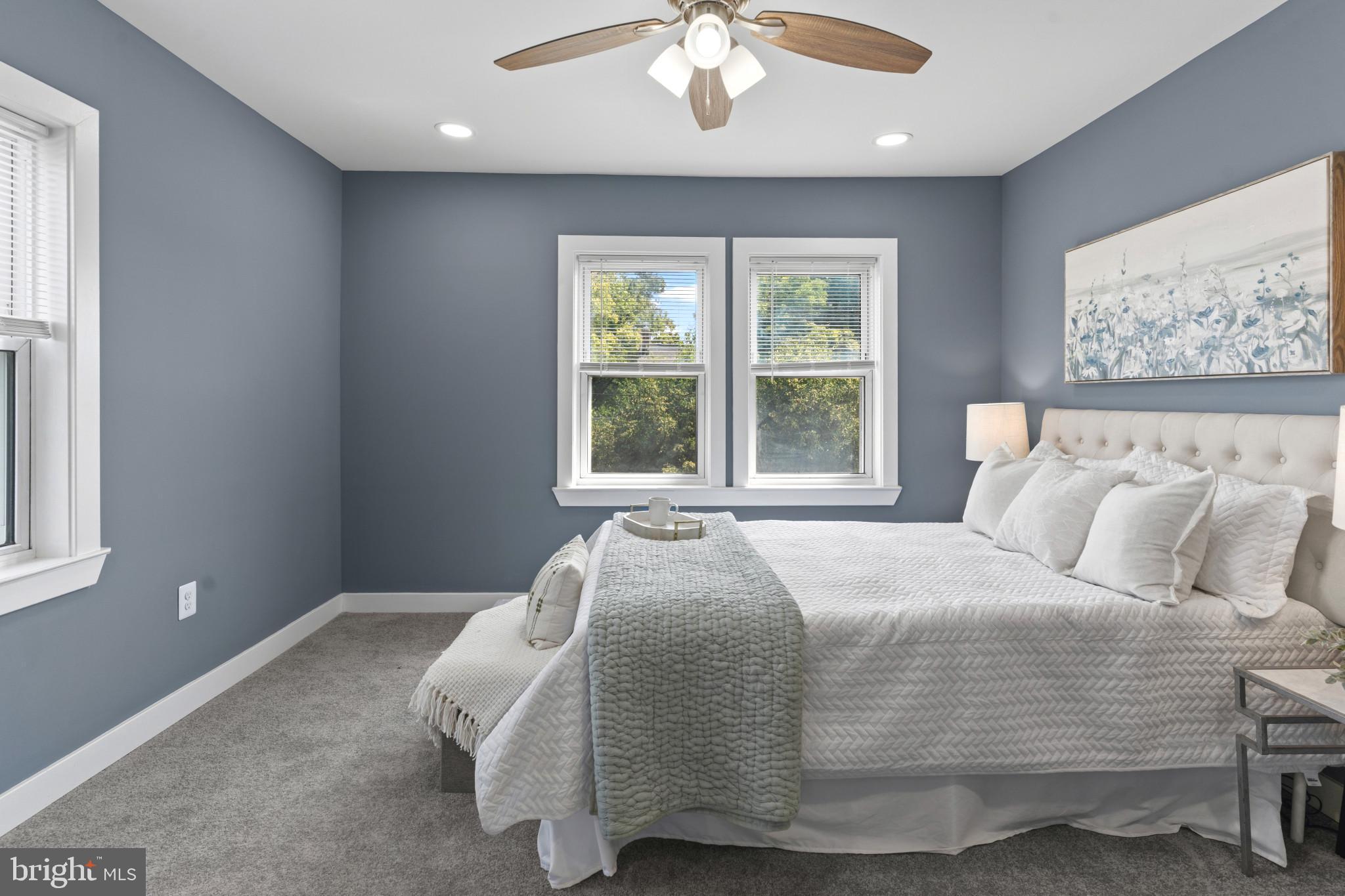 5728 Clover Road Baltimore, MD 21215 - Photo 19 of 40 a bedroom with a large bed and a window